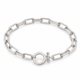 A silver-toned chain link bracelet with a large oval ring closure and a toggle clasp, displayed on a clean white background.