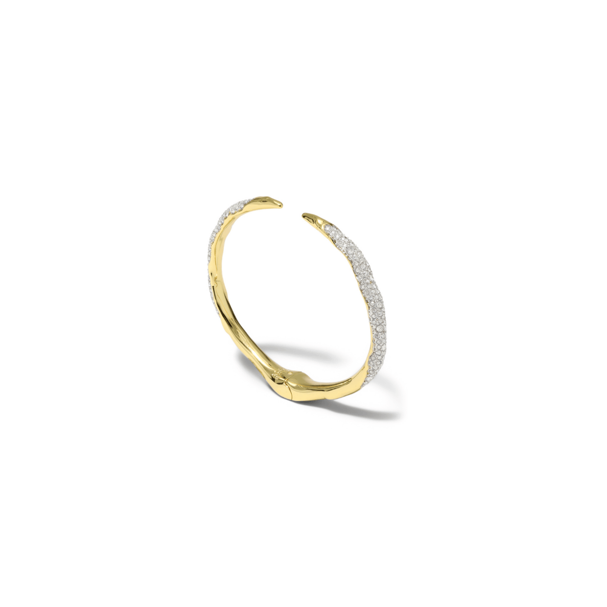 A gold open ring band featuring pavé-set clear stones along the outer curve, shown on a clean white background with a soft shadow.
