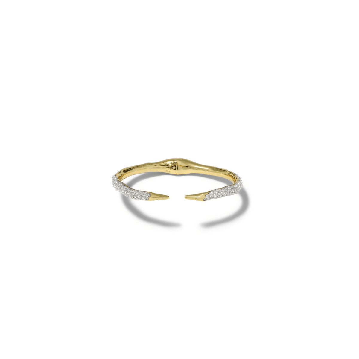 A delicate gold open bangle ring with pavé-set clear stones along the front, displayed on a clean white background with a soft shadow.