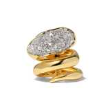 Gold ring with diamond-studded design on a white background