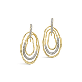Gold and crystal hoop earrings on a white background