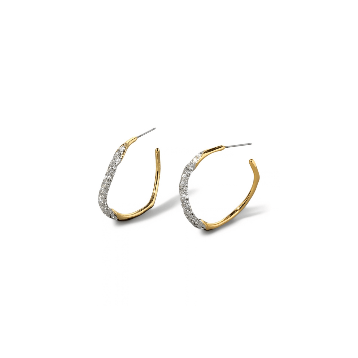 A pair of gold huggie hoop earrings with a curved row of clear pavé-set stones along the front, shown on a clean white background.