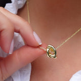 Gold chain knot necklace