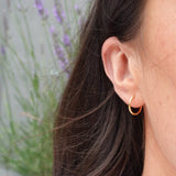 Small gold huggy hoops