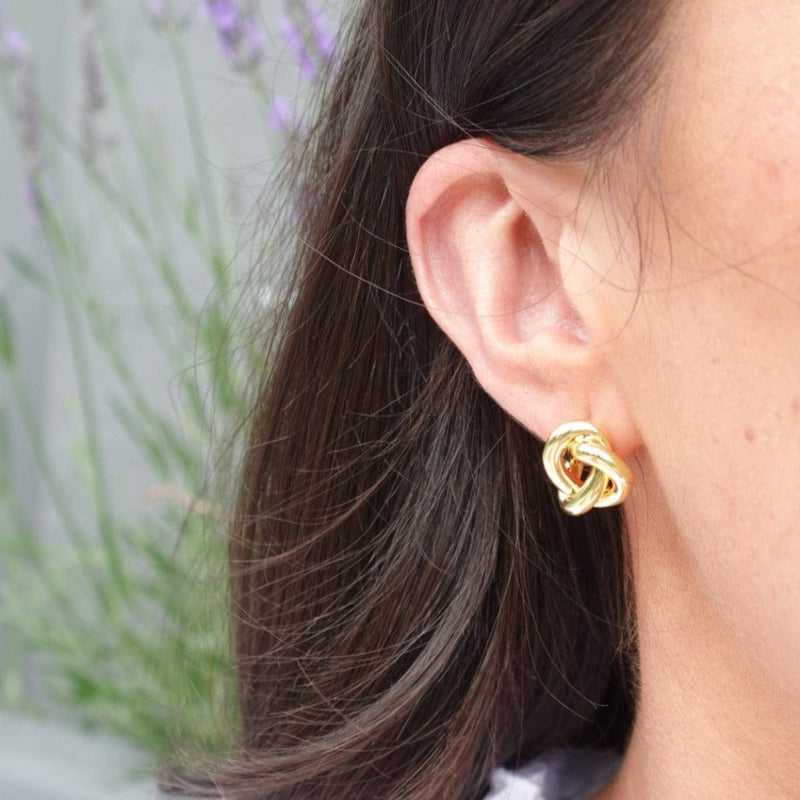 Gold knot stud earrings