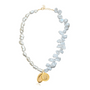 two textured pearl necklace with gold plated charms attached 