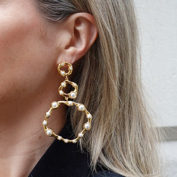 gold hoop earrings with pearl detailing