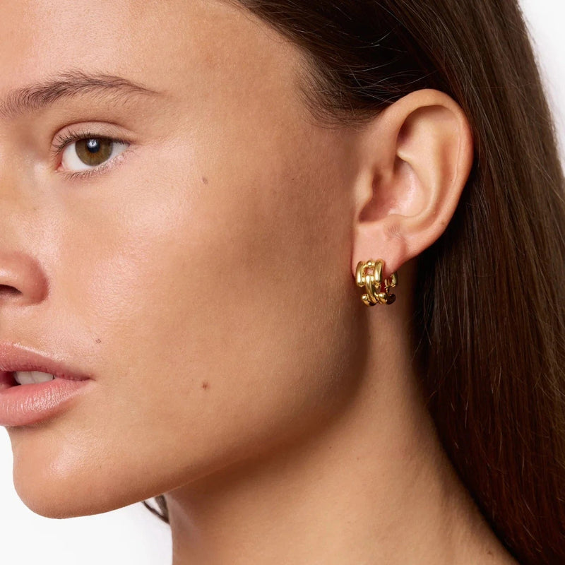 Thick gold huggy hoops