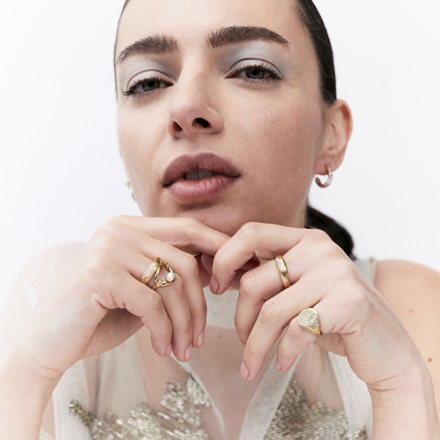 solid gold ring stack and earrings