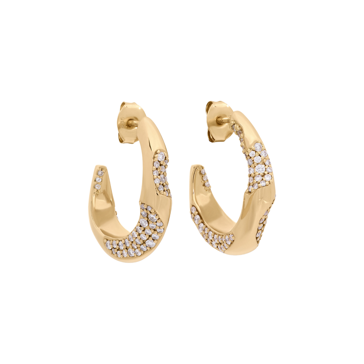 A pair of gold huggie hoop earrings with pavé-set clear stones, shown against a plain white background.