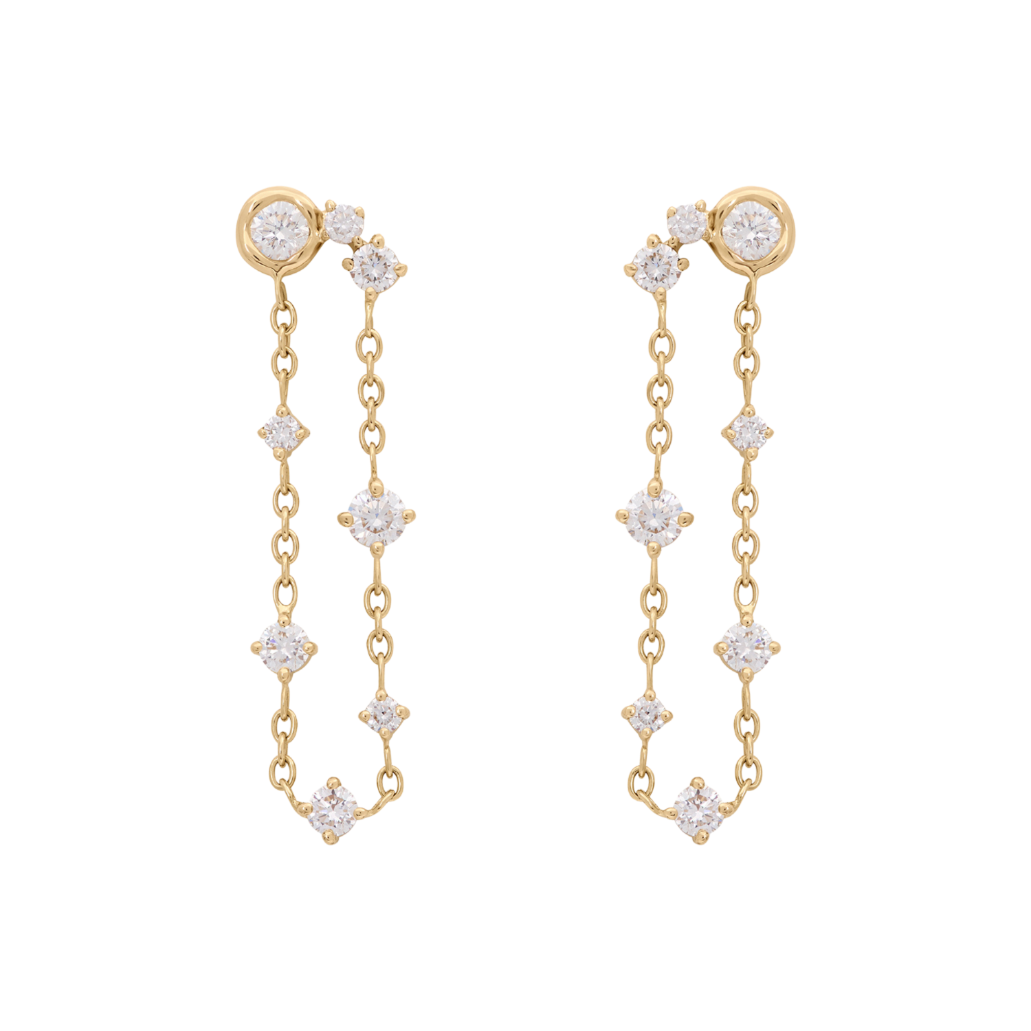 A pair of gold dangle earrings with clear gemstones, displayed against a solid white background.