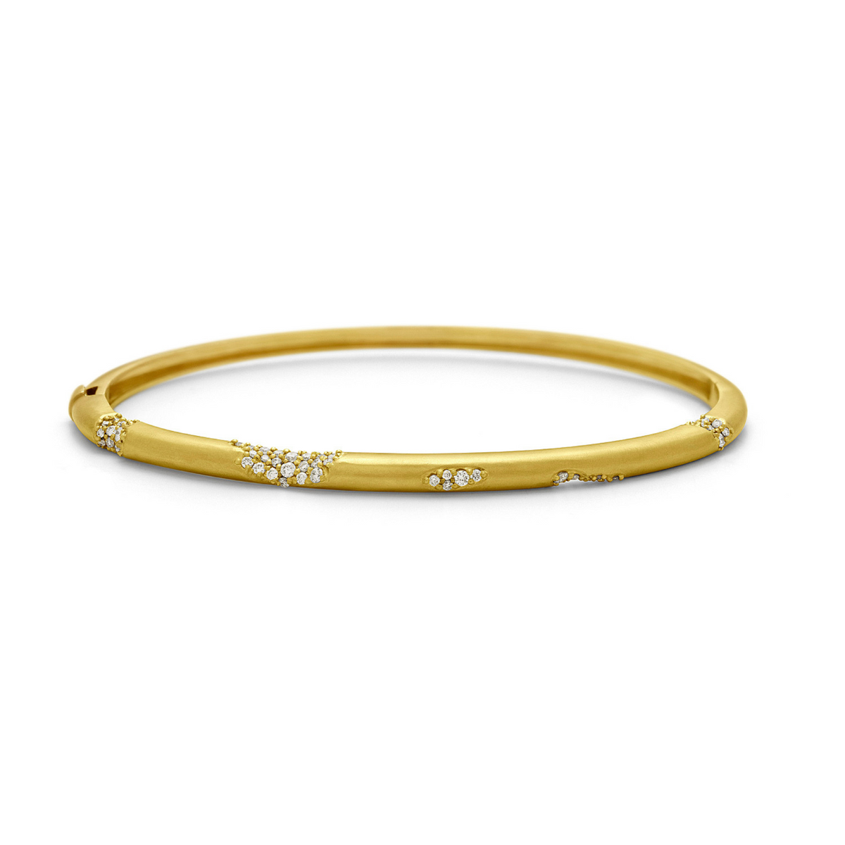 A yellow gold hinged bangle bracelet with small pavé diamond accents along the front, displayed on a clean white background.