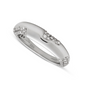 A polished silver-toned band ring with four small pavé diamond clusters spaced along the top curve, shown on a clean white background.