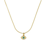 Gold necklace with an eye-shaped pendant on a white background