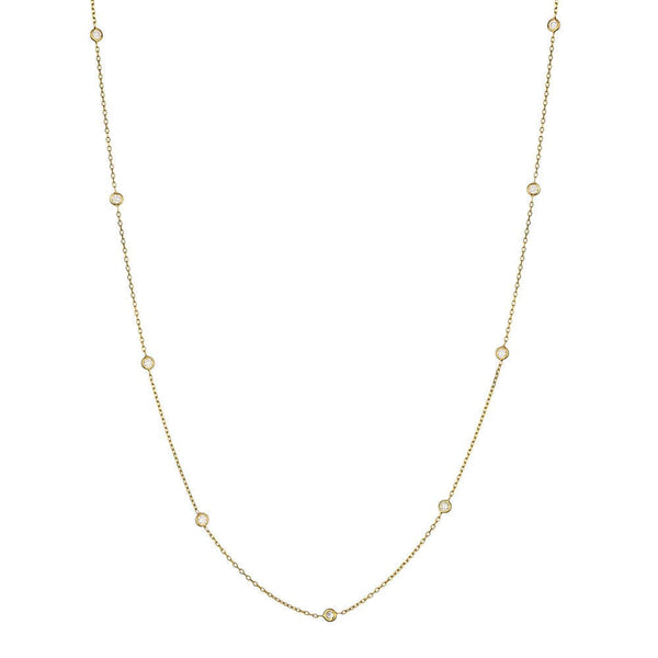 Delicate gold necklace with small diamonds on a white background