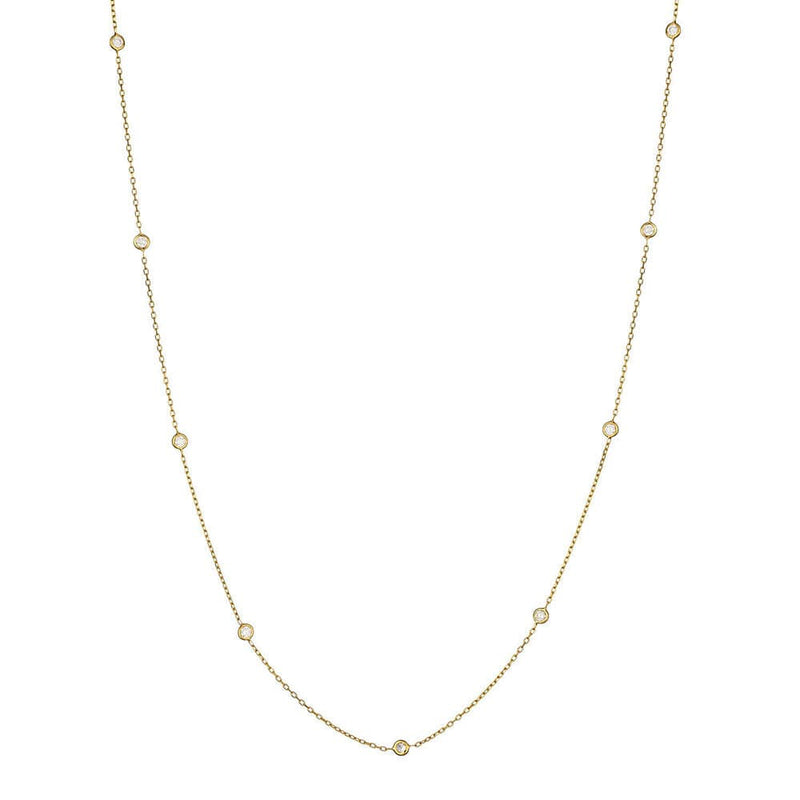 Delicate gold necklace with small diamonds on a white background