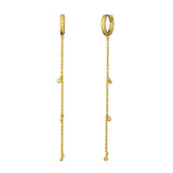 Gold hoop earrings with chain drop on a white background