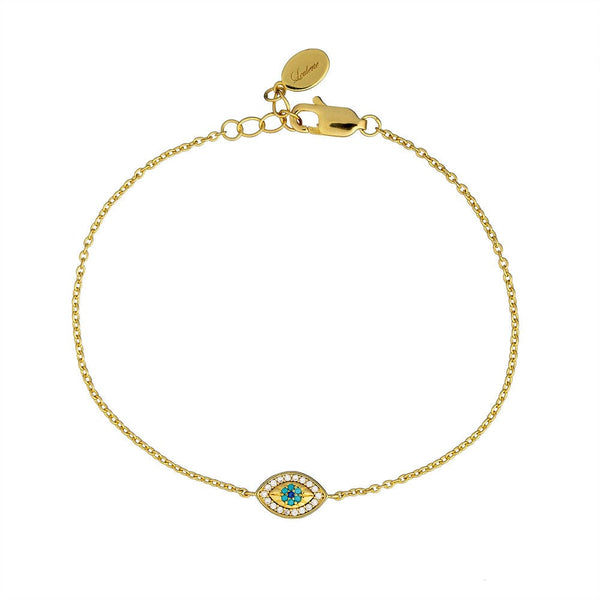 Gold bracelet with an evil eye charm on a white background