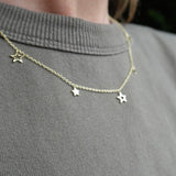 lightweight gold chain with star charms