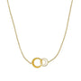 Gold necklace with interlocking rings on a white background