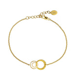 Gold bracelet with interlocking rings on a white background