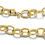 Gold chain necklace on a white background