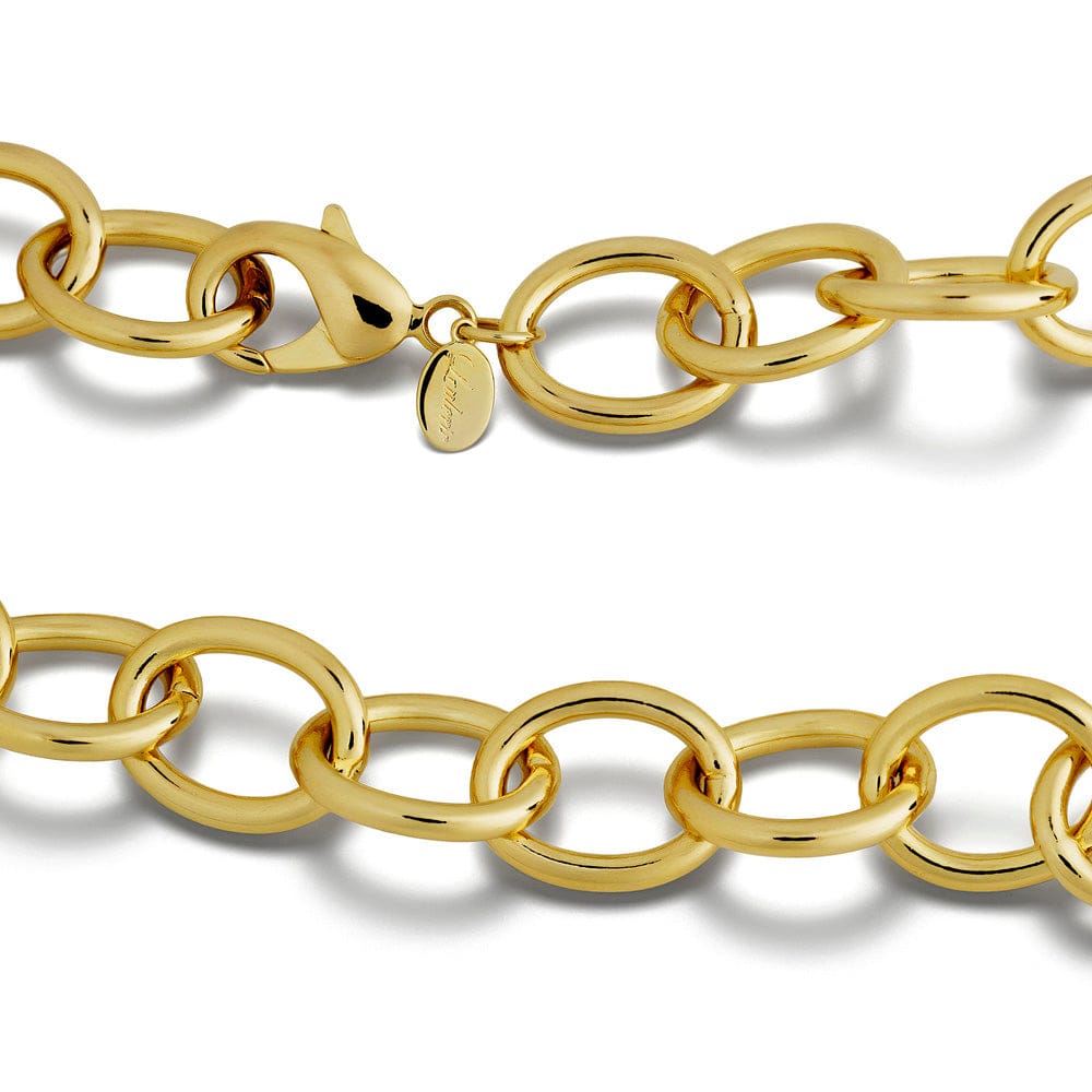 Gold chain necklace on a white background