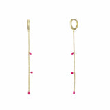 Gold chain earrings with pink beads on a white background