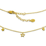 Gold necklace with star charms on a white background