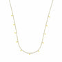Necklace with small yellow beads on a white background