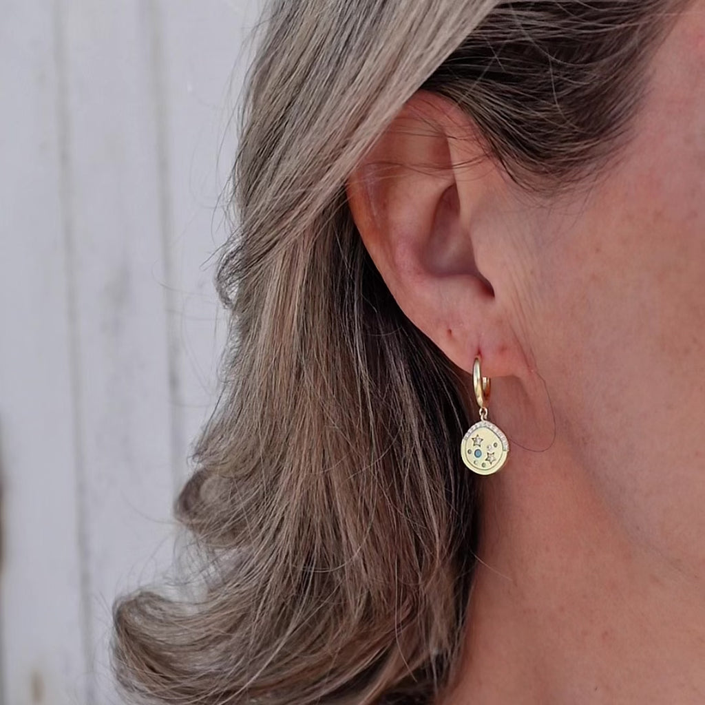huggies - video - gold earrings - crystal 
