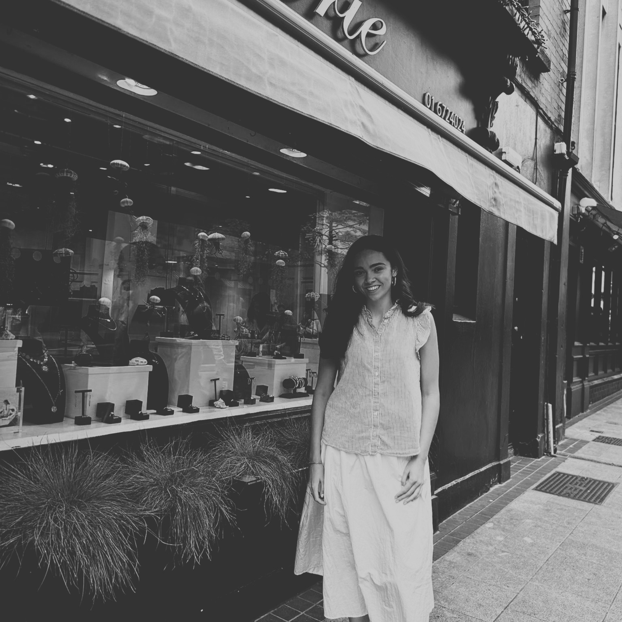 Aoife, a Sales Advisor standing outside the Loulerie Dublin store