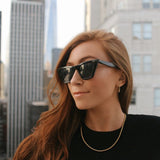 Retro Flame X Loulerie | The Carmine Necklace | Gold Plated Chain Model Erika Sunglasses Lifestyle Image