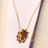 Gold plated sun pendant